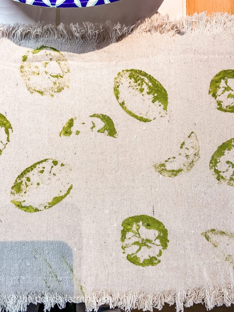Lime design stamped on drop cloth fabric to make a DIY Table Runner Ideas.