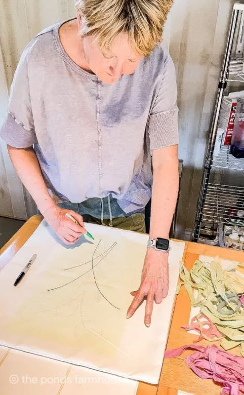 tracing the pattern onto the pillow cover