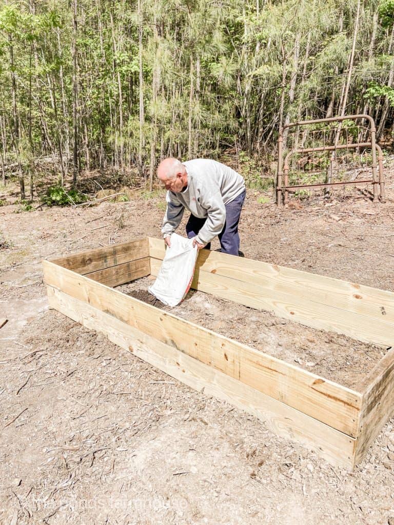 Fill garden beds with garden soil.