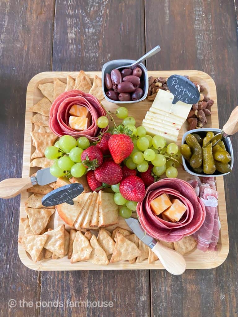 Large Charcuterie Board Ideas allows guest to graze from one appetizer tray or board.  