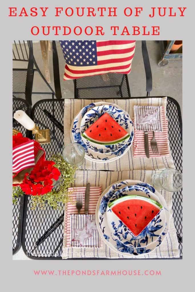 Easy Fourth of July Outdoor Table in the outdoor kitchen.  Keep the table simple & festive with lots of red, white & blue, DIY Napkins & Flags