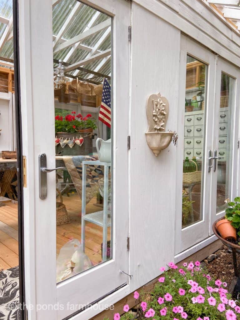 DIY Greenhouse made from reclaimed french doors.