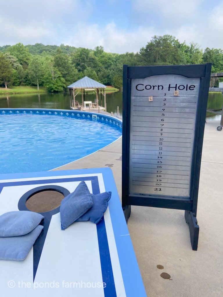 Wooden thrift store find used to make a corn hole score board