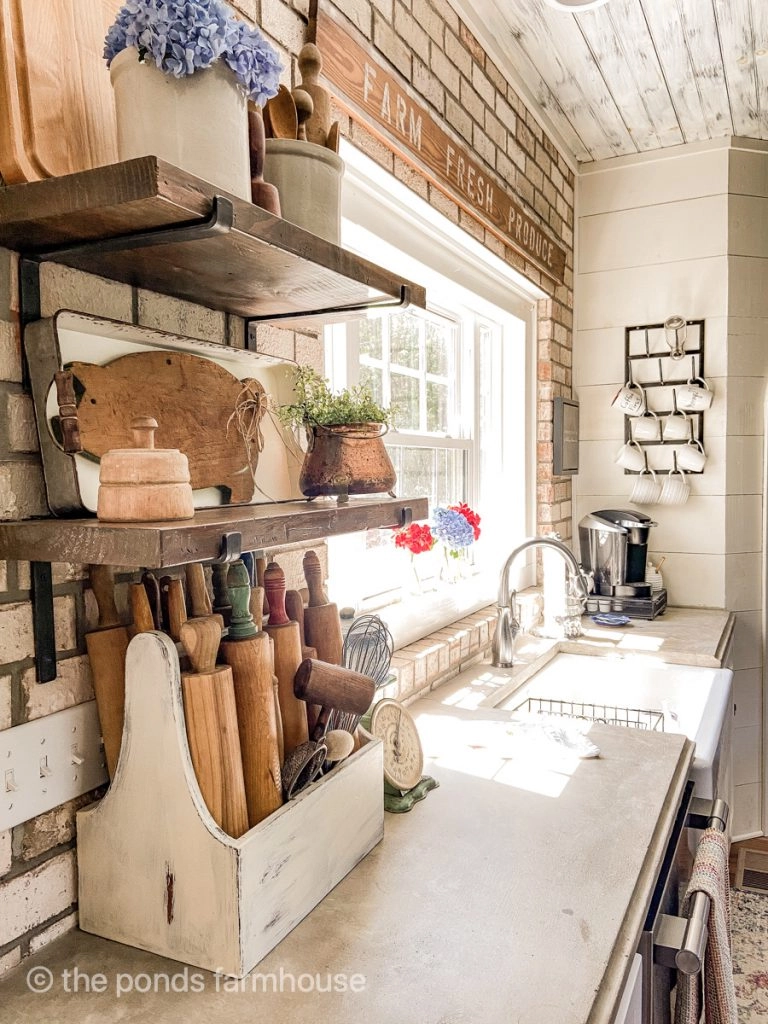 Open shelving filled with vintage finds in modern farmhouse