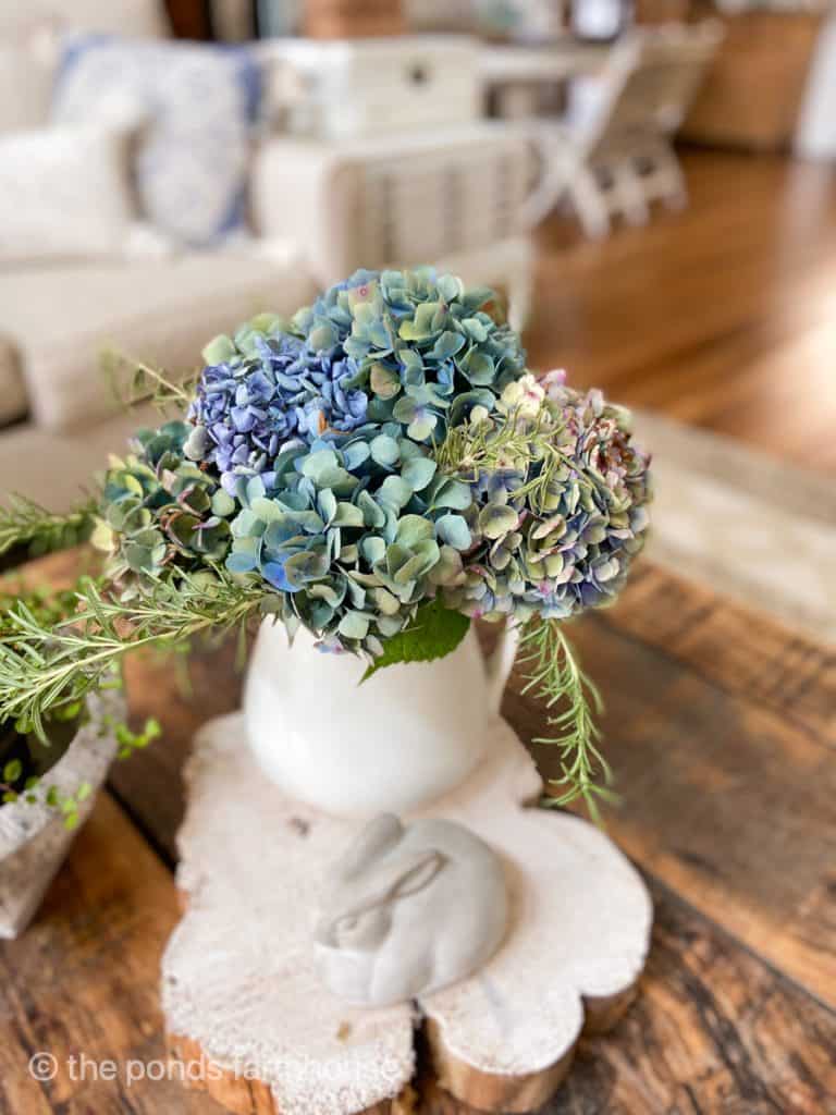 Hydrangeas with rosemary.  Plant herbs to add to flower arrangements.