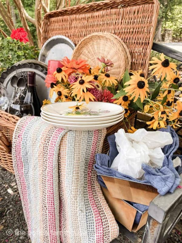 Picnic basket with everything for a picnic table setting for summer entertaining
