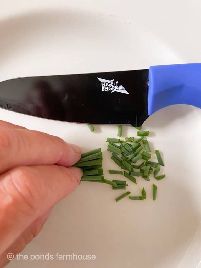 Chop fresh chives.