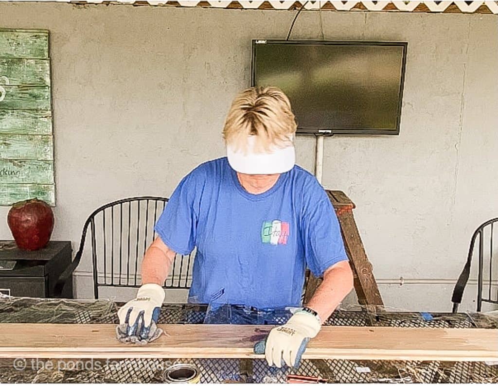 Rub stain onto the new pine wood.