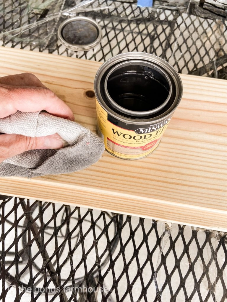 Use an oil-based stain to age the new wood.
