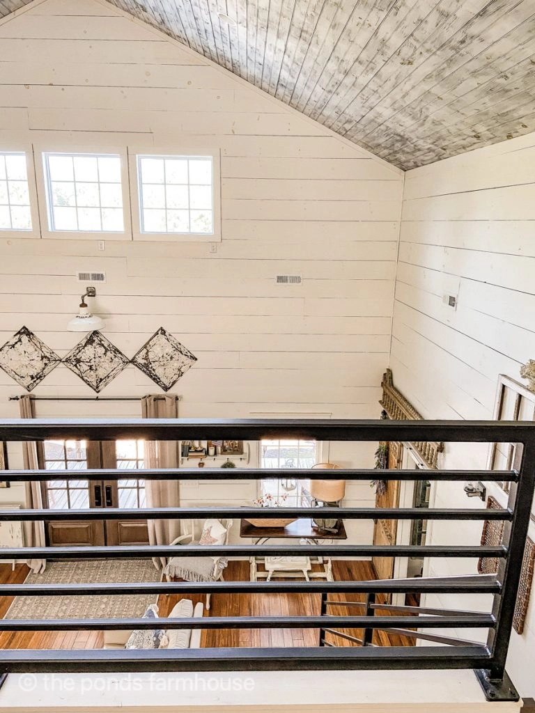 White Wash Wood Ceiling Technique loft view with shiplap walls and reclaimed ceiling tiles