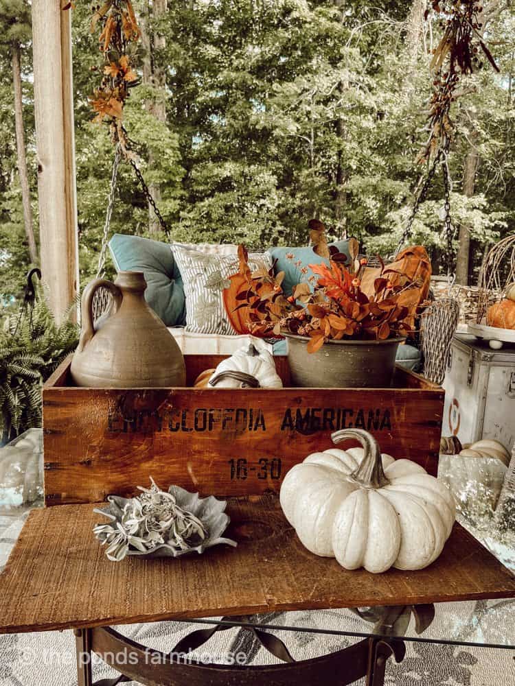 Vintage wooden box filled with fall decor for Front Porch decorating.