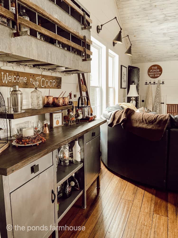 Industrial Farmhouse Fall Decoration in loft bar made from vintage hospital carts and old nesting box.  