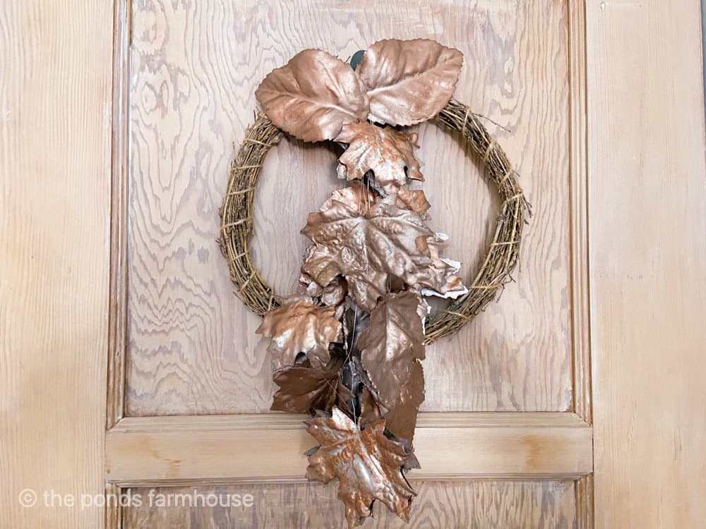 DIY Fall Plaster Leaves Painted Copper for Craft Fall Swag Wreath made with recycled faux leaves.