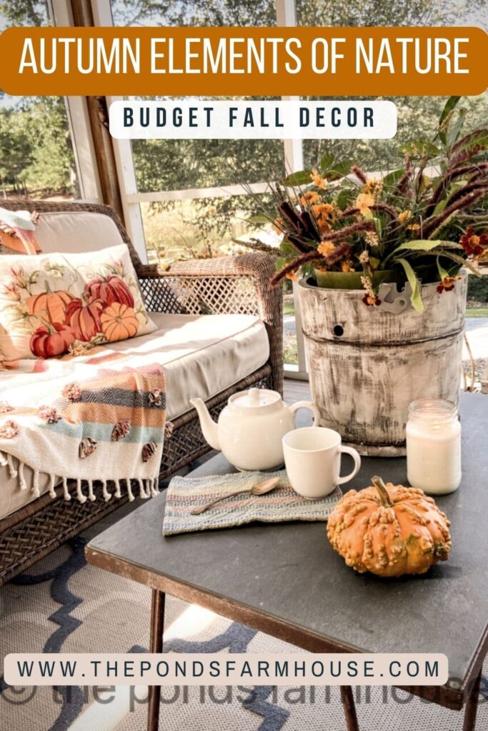 Autumn Elements with vintage ice cream bucket and faux fall plants.