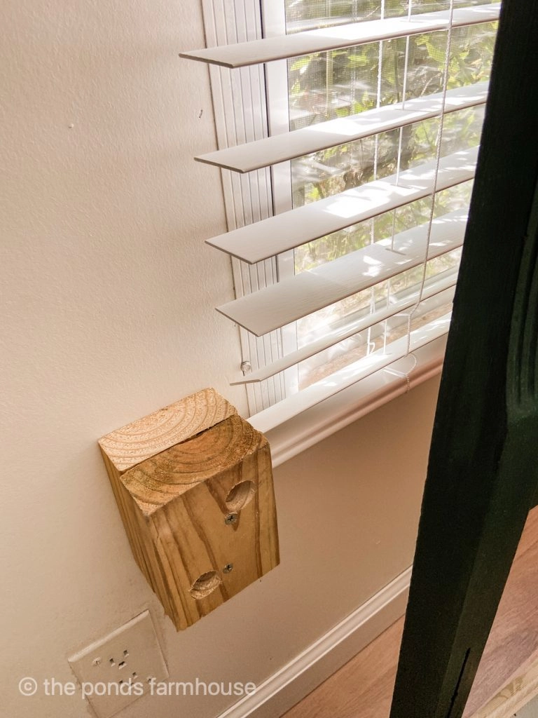 Attach spacer blocks if using a vintage headboard in front of a window