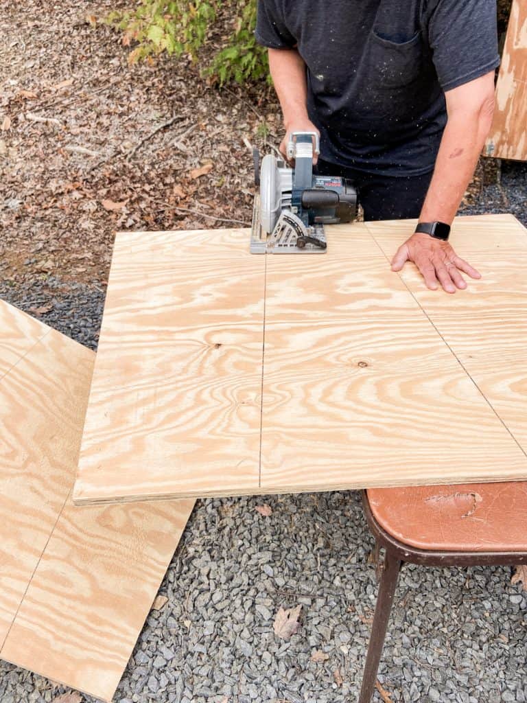 Plywood to cut out tree and plant container. Cut with circular saw.