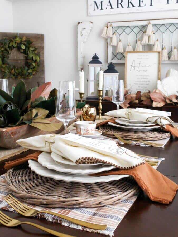 Thanksgiving Tablescape with vintage milk glass plates and vintage silverware.