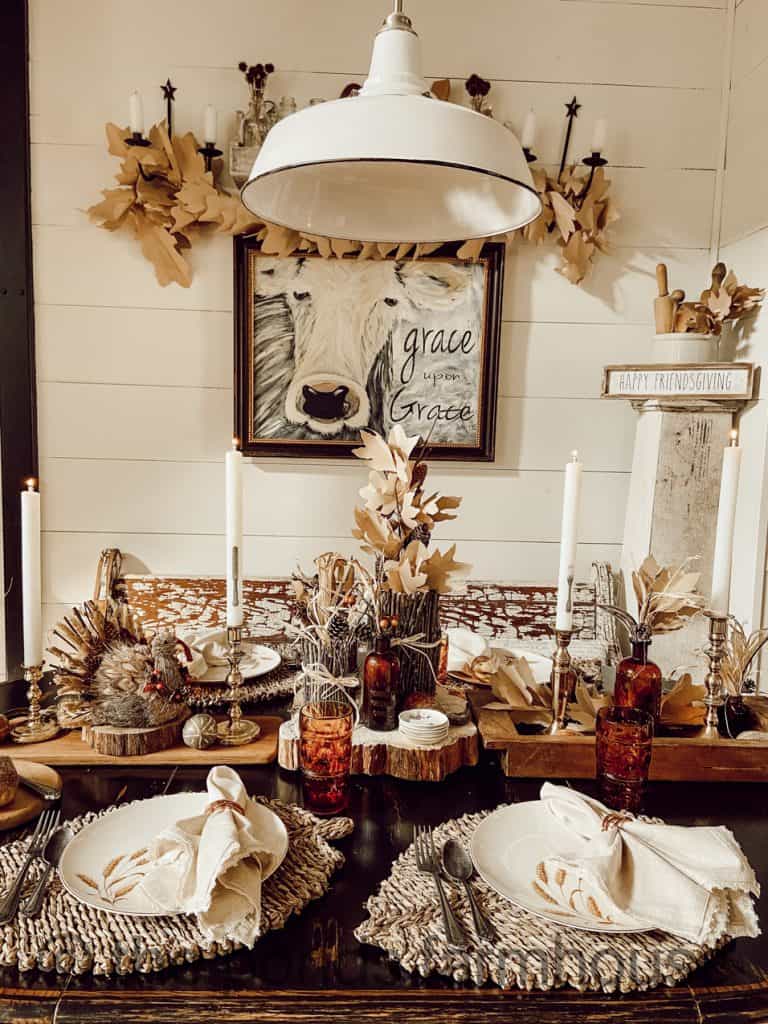 Cow painting over Thanksgiving Table Setting Ideas.
