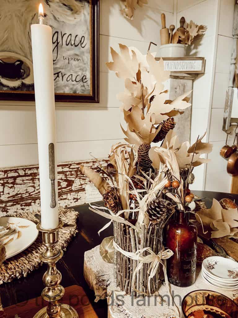 DIY Twig and Tin Can Vases with foraged and DIY Fall Leaves centerpiece for a Thanksgiving Tablescape.
