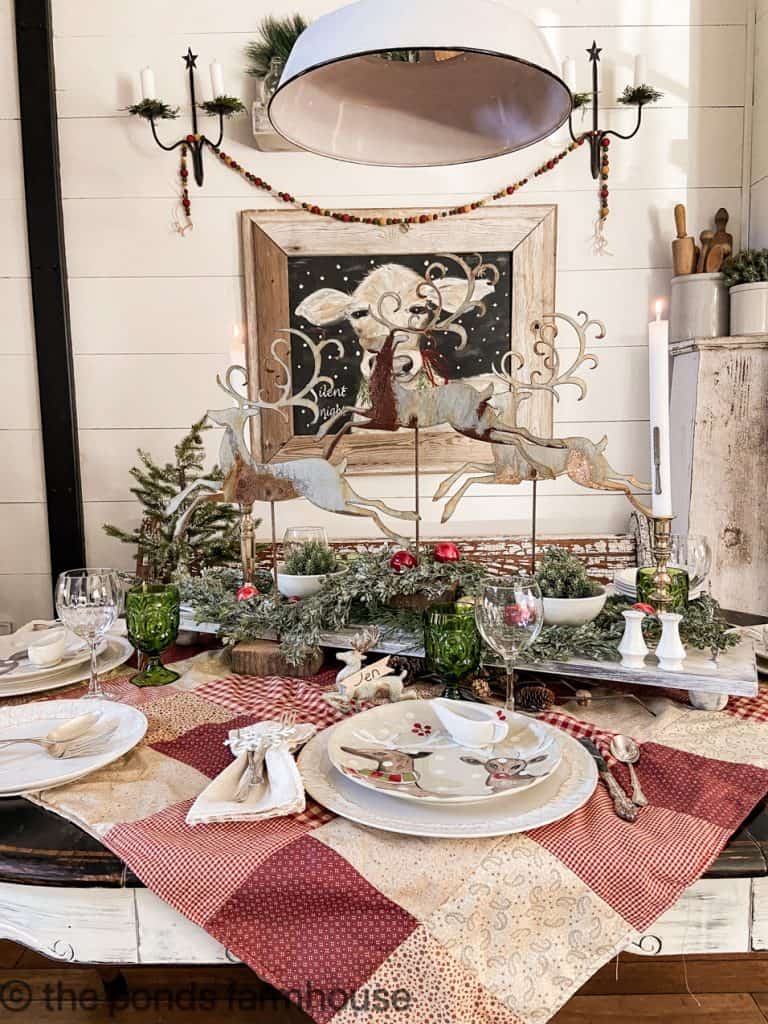 Long view of Christmas Table Setting with Reindeer Centerpiece on DIY table decor Riser & DIY Patchwork Table Cloth