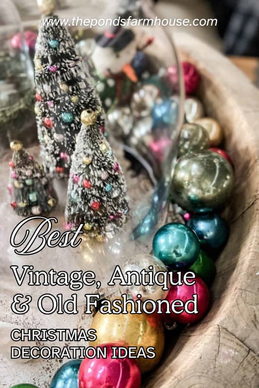 Antique Paper roller filled with flocked pinecones and holiday greenery