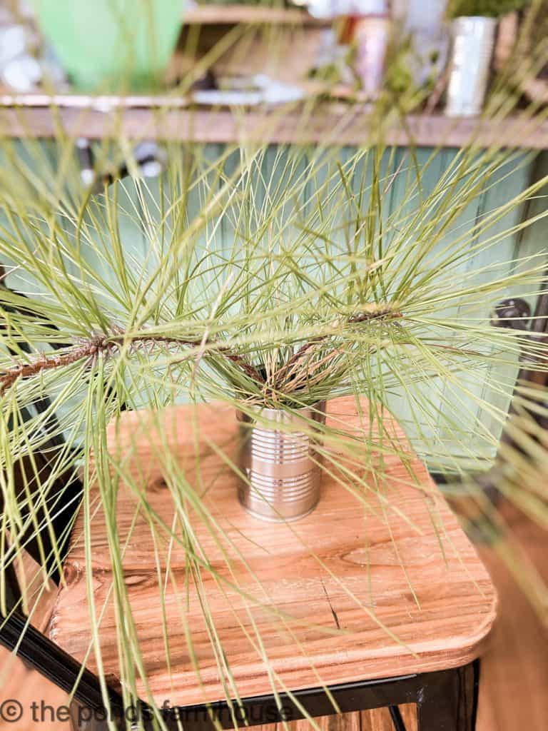 Pine placed in water before arranging.  