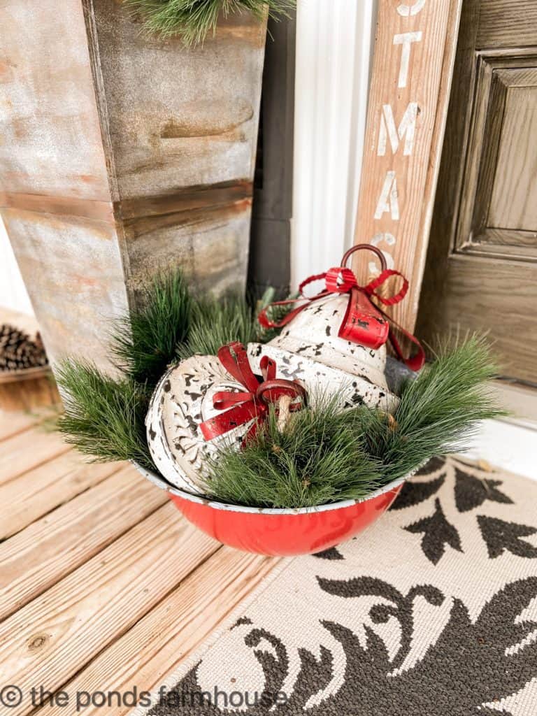 Red and White Christmas Bells in a enamelware bowl