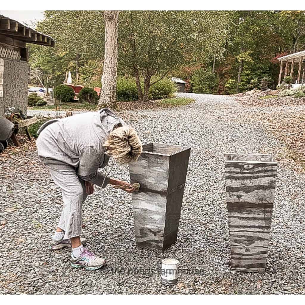 Using a faux technique for DiY Planters to look like galvanized planters.