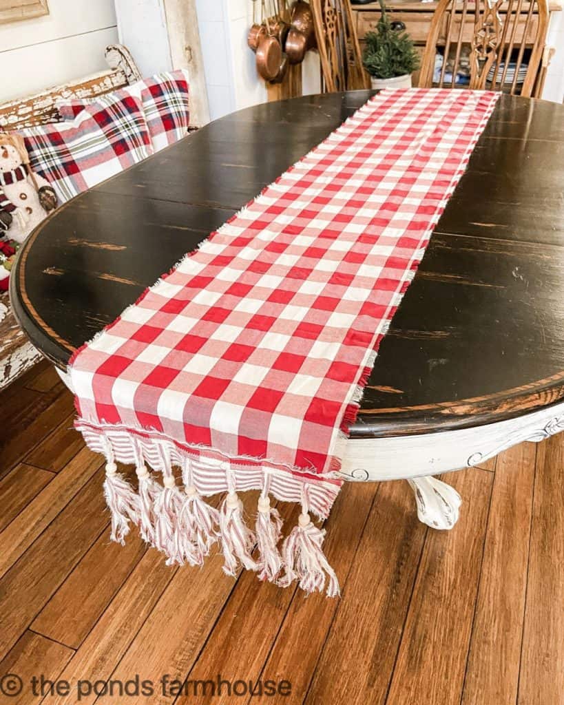 DIY Fabric Crafts - Ticking and buffalo print table runner with tassels.  Easy Christmas Craft ideas