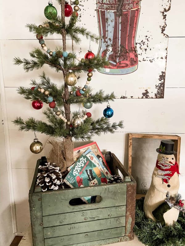 vintage green crate with Christmas Tree and Vintage Children Christmas Books