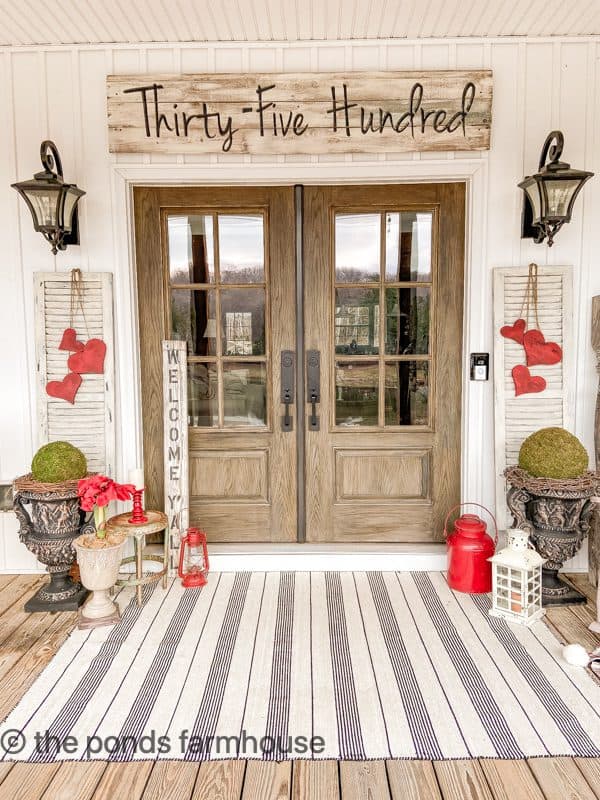 Winter Front Porch with DIY Heart Swag on vintage shutters.  