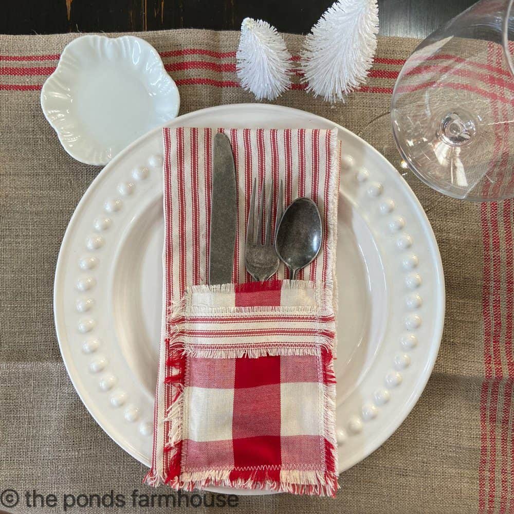 DIY Fabric Crafts - Ticking and buffalo print napkins with cutlery pockets.  Easy Christmas Craft ideas