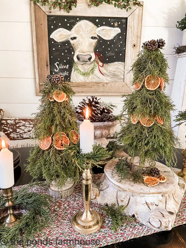 DIY Real Cedar & Orange Topiary tutorial for cost-effective holiday decorating ideas.