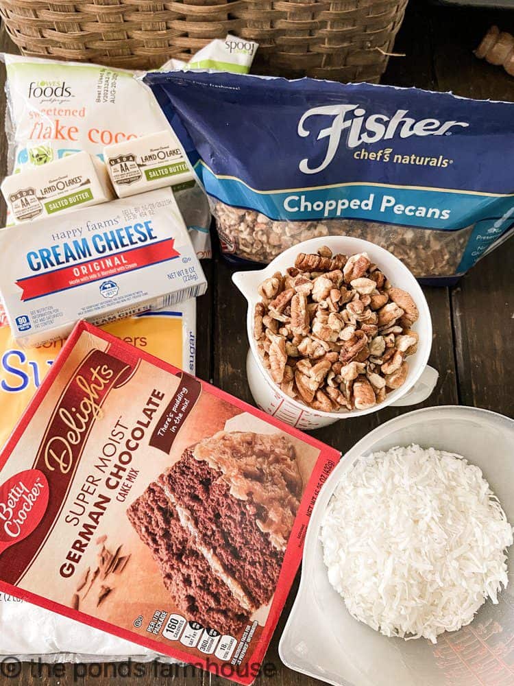Ingredients for upside down German chocolate cake. Cake mix, coconut, pecans cream cheese, butter