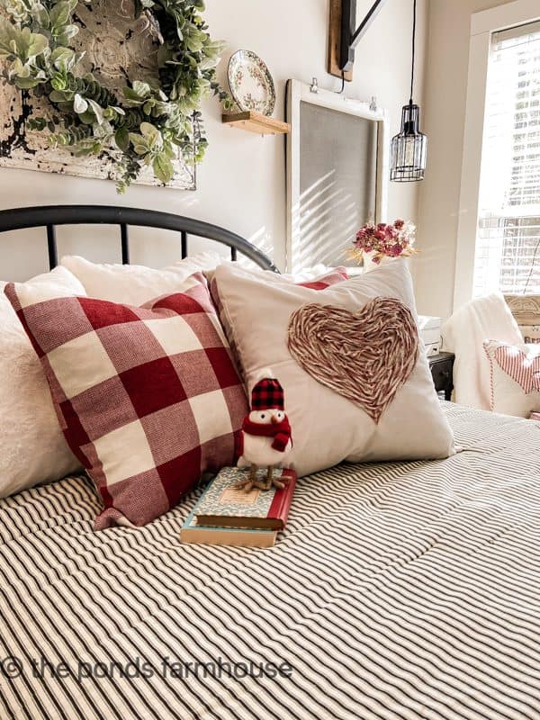 Scrape fabric heart pillow cover with red and white buffalo check pillows and snow bird.