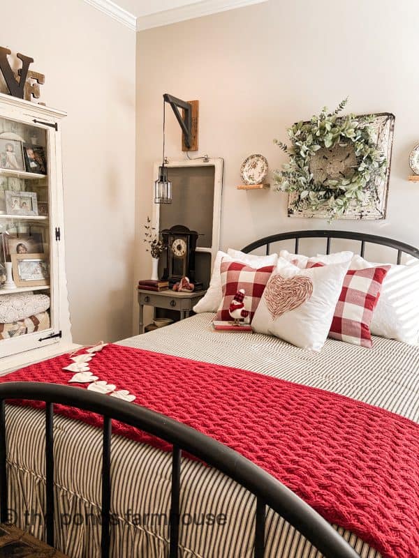 Valentine's Day Tour of Guest Bedroom with red and white pillows and throw blanket.  Scrape fabric pillow.