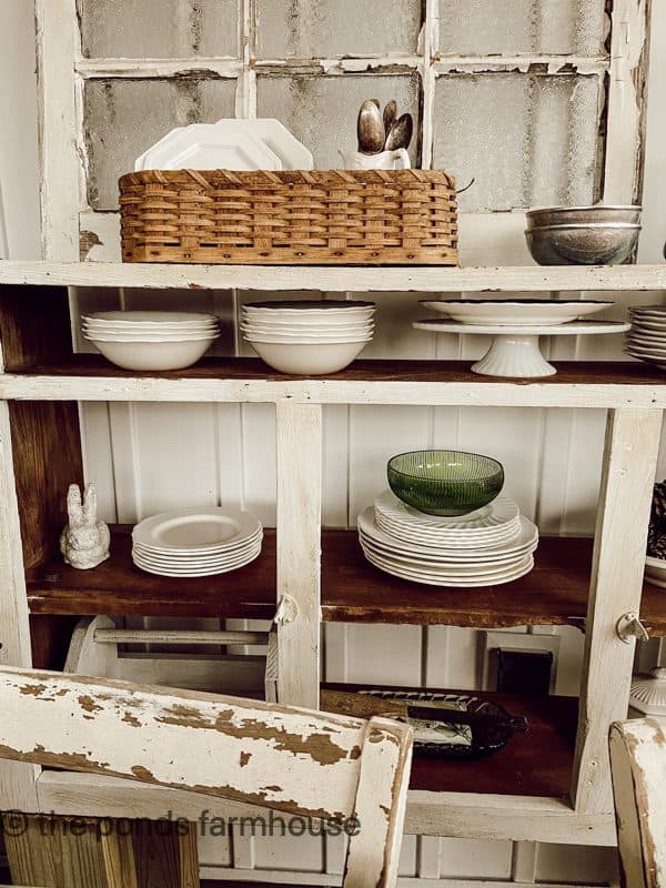 Stack of White vintage ironstone plates for winter decoration ideas and ways to beat the January blahs