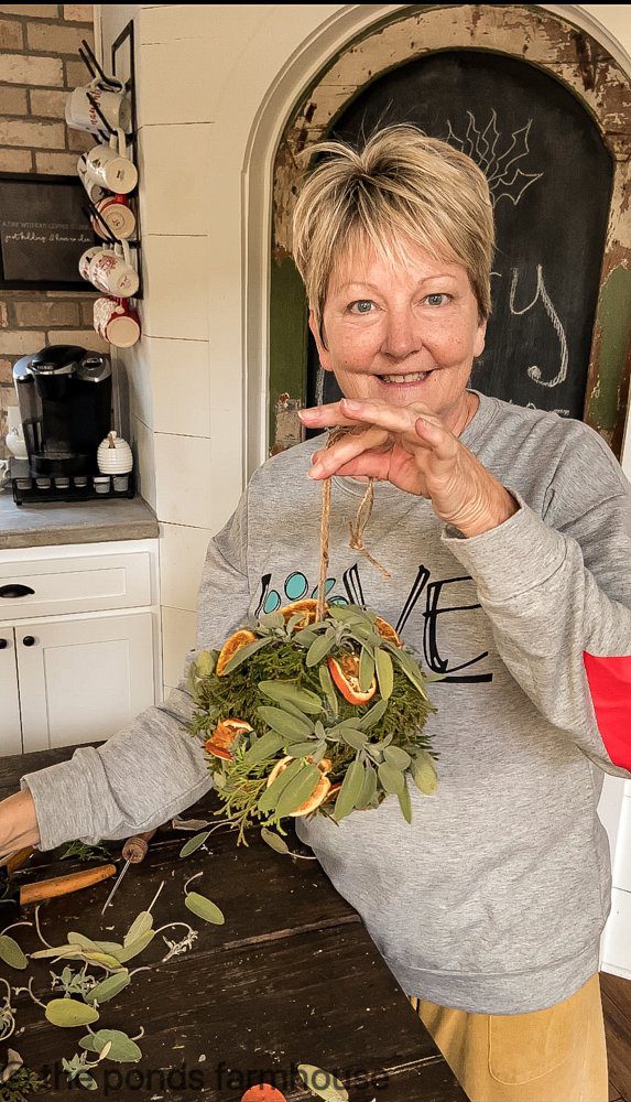 Use herbs and fresh greenery for sustainable Christmas decoration that works both farmhouse and cottage style homes.