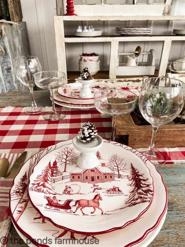 Vintage Christmsa plates and plaid table runner.