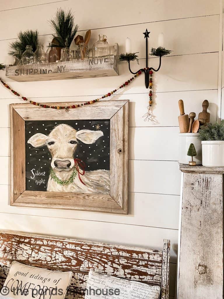Original Sophie Silent Night Painting over dining room table with vintage Christmas Decor.