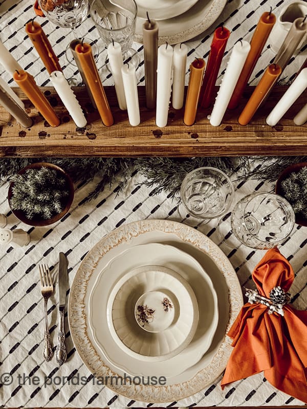 A combination of diy and thrifted items make up the cozy winter tablescape.