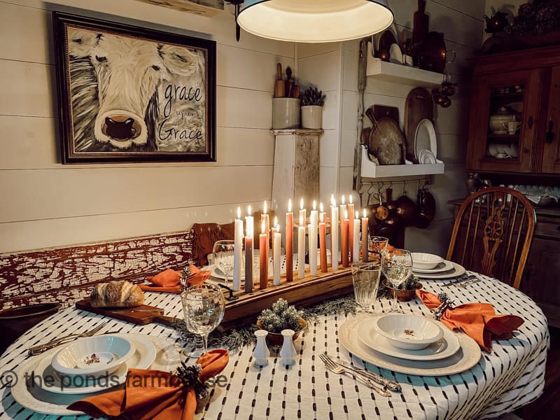 Cozy Winter Tablescape with DIY Candleholder and rustic twig napkin rings.