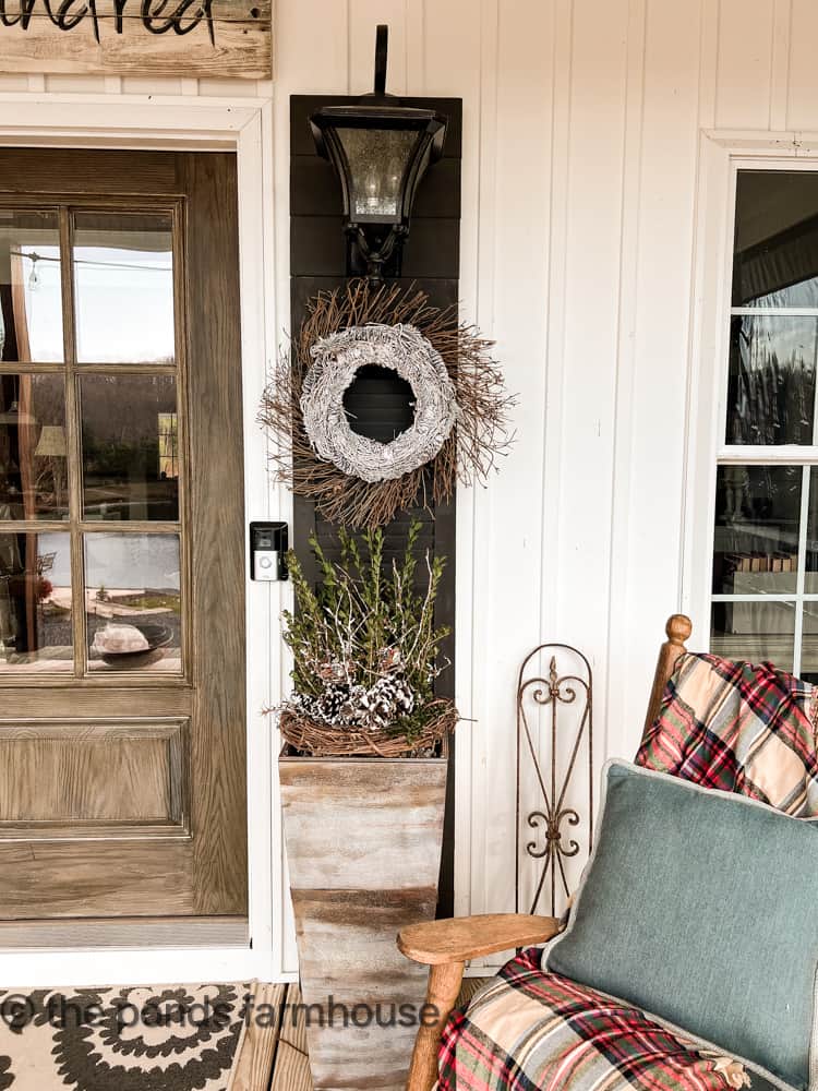 snowy wreath and foraged materials for Winter Outdoor Planters 