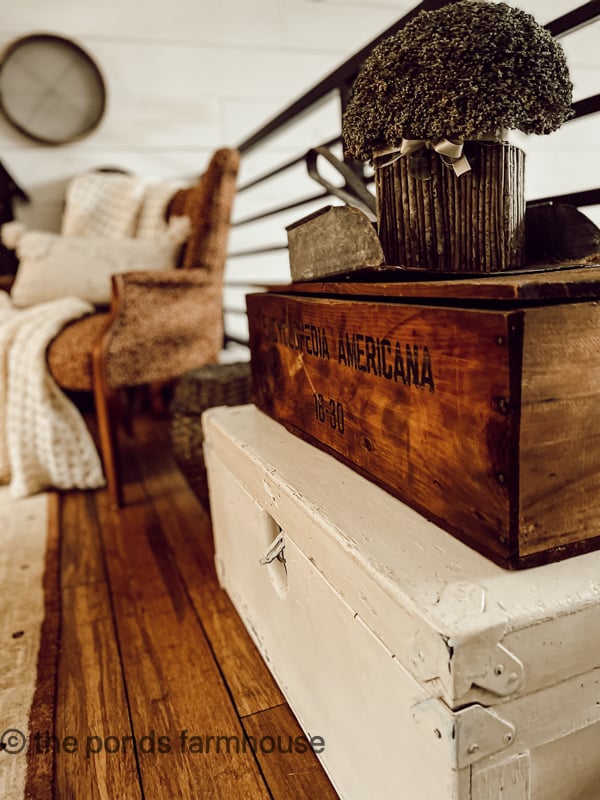 Stack of wooden boxes add a cozy feel to the Industrial Style Loft