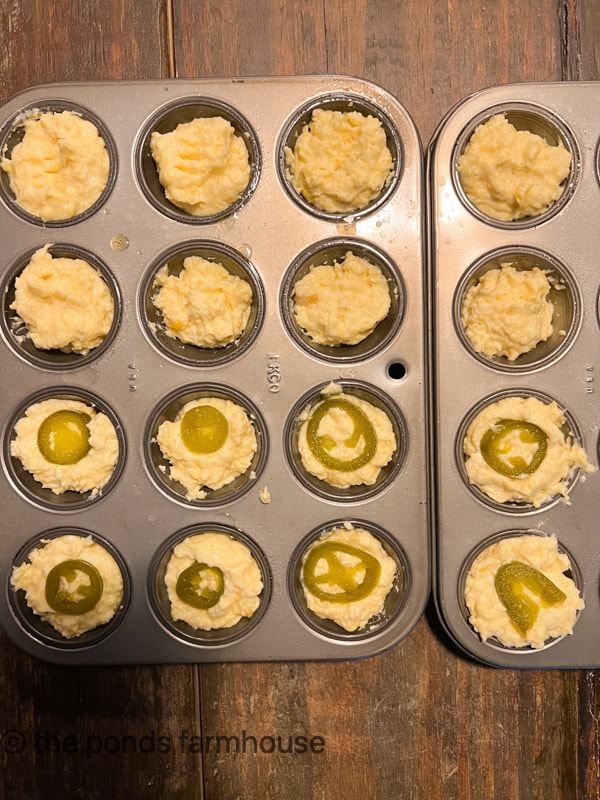Fill muffin tins with cornbread muffin recipe batter.