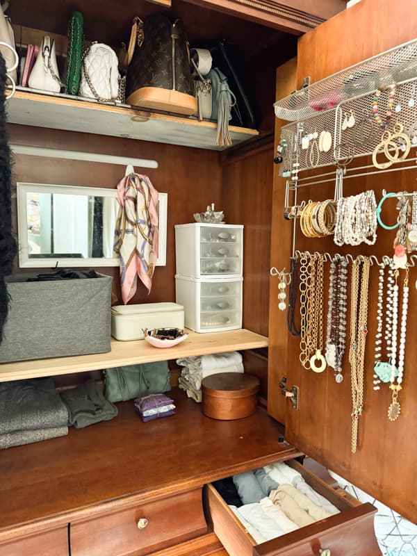 old TV cabinet repurposed for jewelry and lingerie