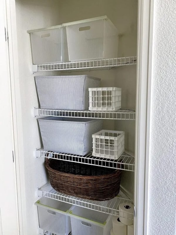 Get organized with these linen closet organizing tips.  