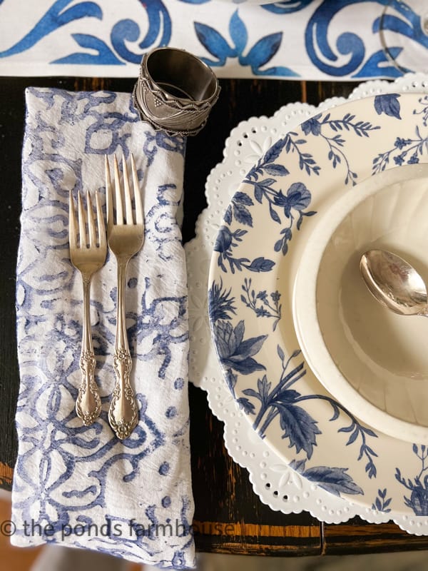Custom Napkins made from flour sack towels with blue tile print with blue and white dishes for Italian Tablescape.
