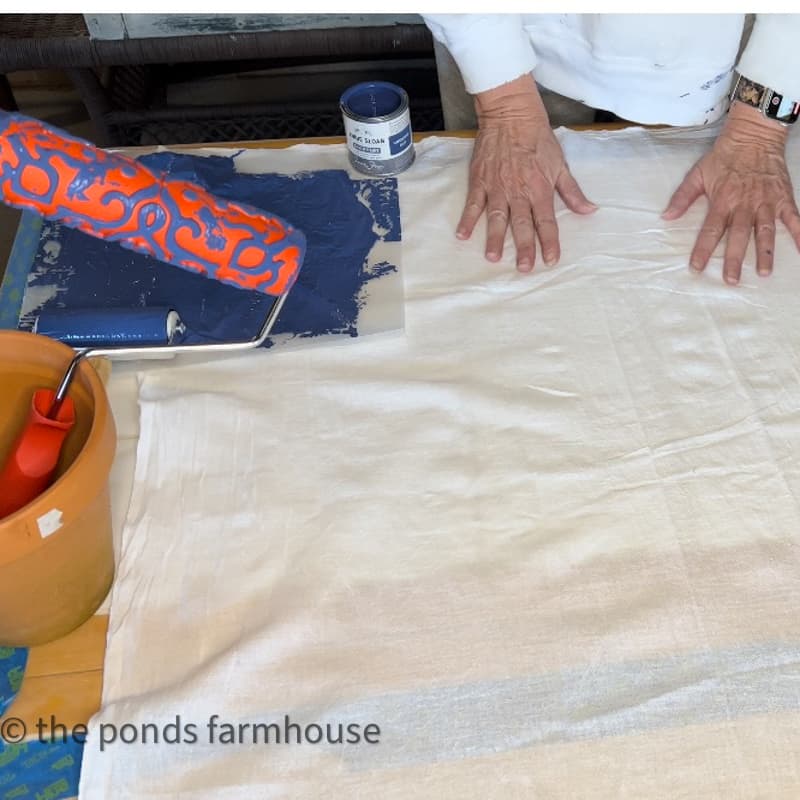 Spread the flour sack towel onto a flat surface.  To prepare to make DIY handpainted napkins