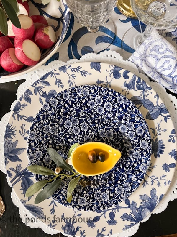 blue and white Italian Dinner Table with lemon accessories.